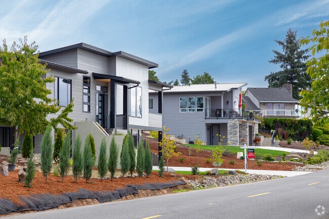 Newly constructed modern homes are available for sale on SE Riverside Dr in Riverview.