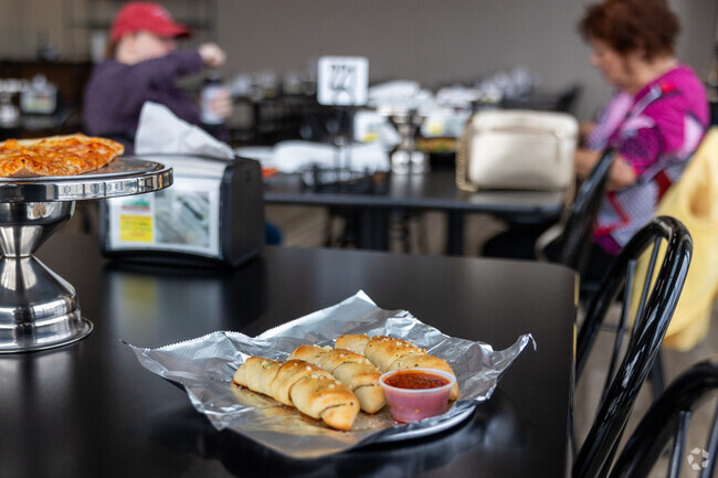 Residents of Vandever Trails enjoy one of the many restaurants.