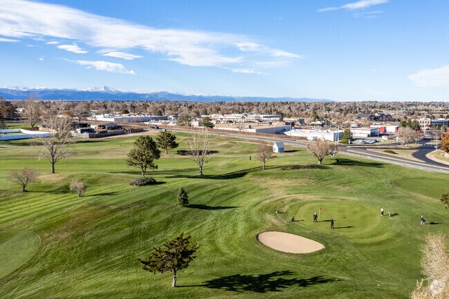 Golfer enjoy a round at Greenway Park Golf Course in Greenway Park, Broomfield, Colorado.