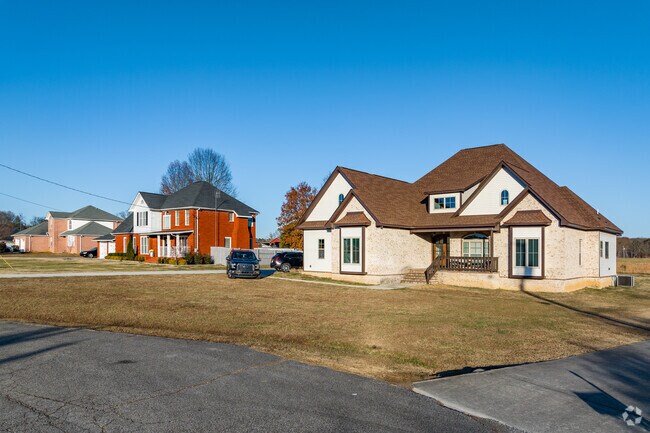A row of large brick homes on large lots in Ready Crossing.