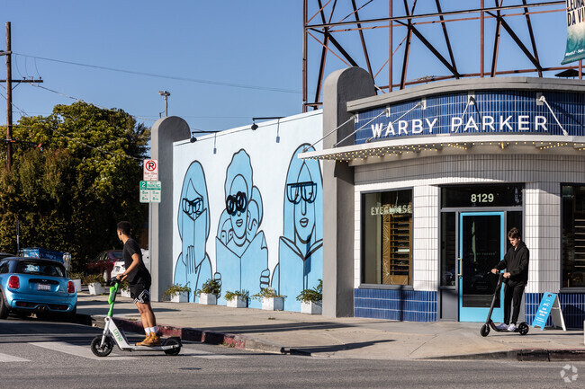 The eye wear shop in Beverly Grove has an art mural on its building.