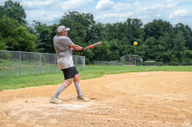 Get in some batting practice at a local baseball field in Savage.