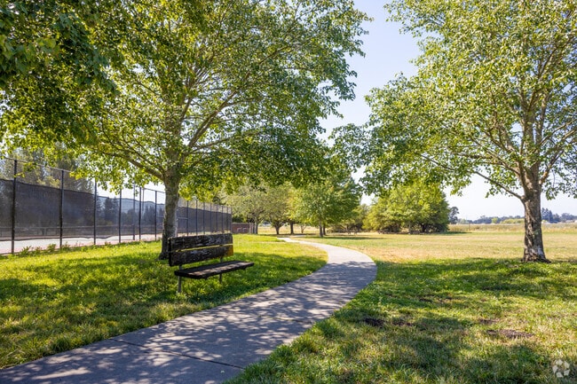 Maddux Ranch Park offers shady paths winding through lush greenspace in Larkfield-Wikiup.