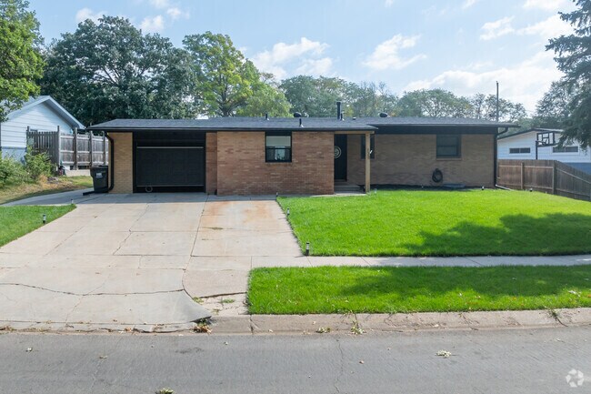 There are some brick houses in the Meadowlane area.