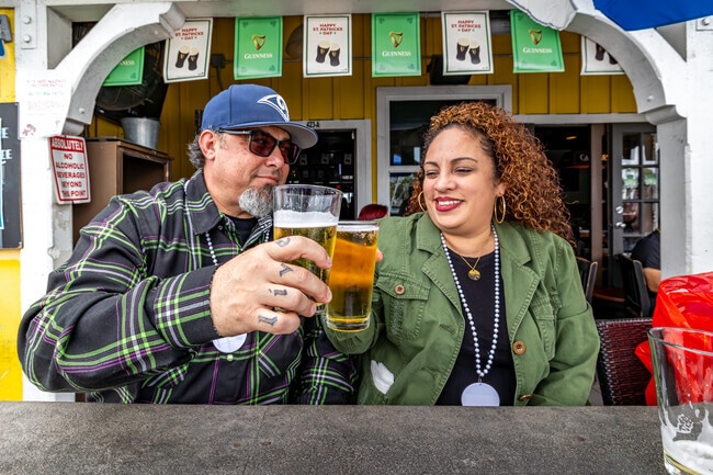 A couple cheers to good times at the Long Beach Mardi Gras Event near Central.
