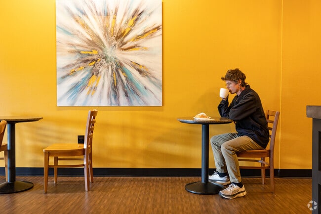 Visitors enjoy quiet coffee and dessert at Drip Coffee House near Sun Hills.