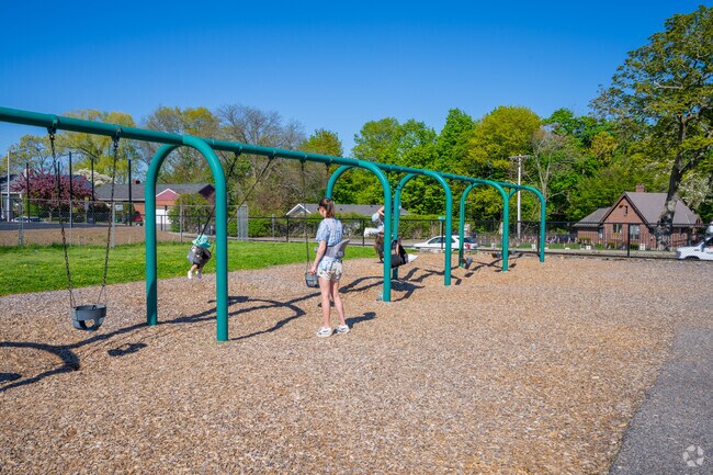 Bring the toddlers or your kids to the swings at Grove Street Park in Wavelery Square.
