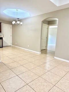 TILE FLOORS, VAULTED CEILINGS AND MUCH MORE!