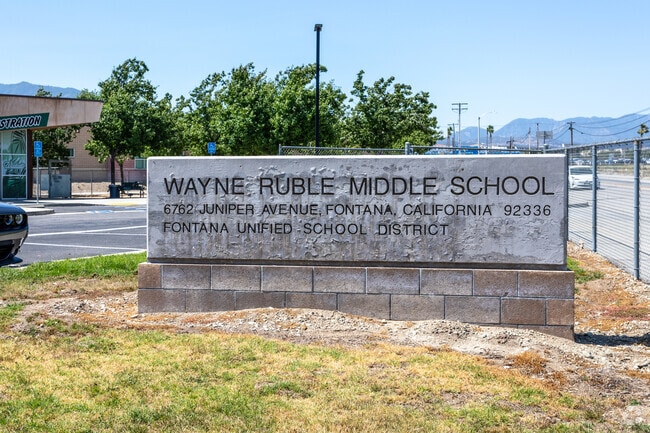 The signage at the entrance of Wayne Ruble Middle School proudly displays its name.