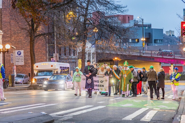 The Irish Heritage Club of Seattle hosts the Laying of the Green Stripe in Downtown Seattle.