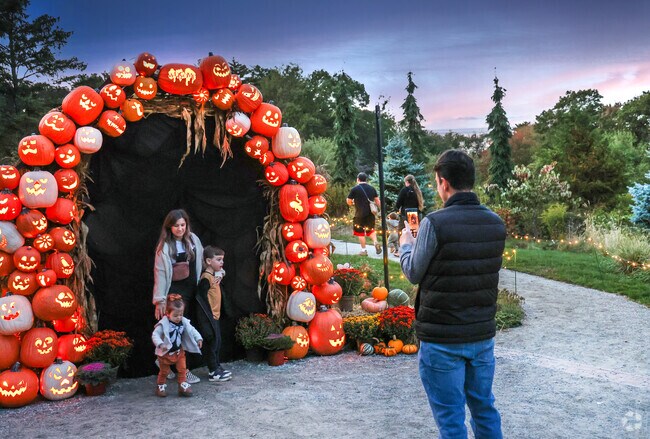 Families enjoy the many photo ops at Halloween on the Hill in Centerville.