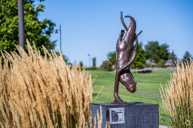 Discover stunning sculptures along the scenic walking paths at Quail Park near Lexington Estates.