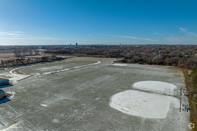 There is a track and multiple baseball fields at Oak-Land Middle School.
