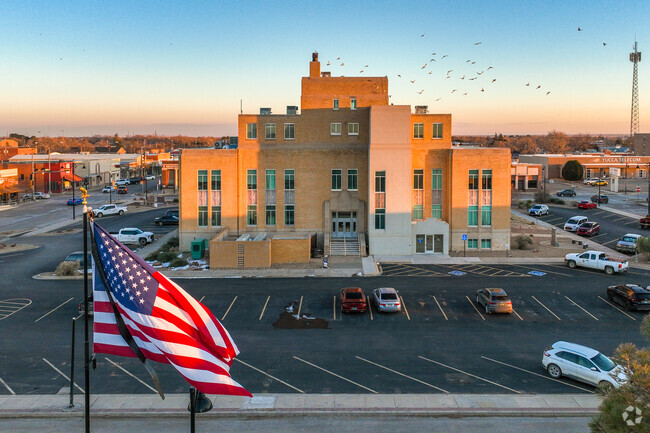 Roosevelt County Courthouse, an Art Deco building built in 1938, sits on the town square.