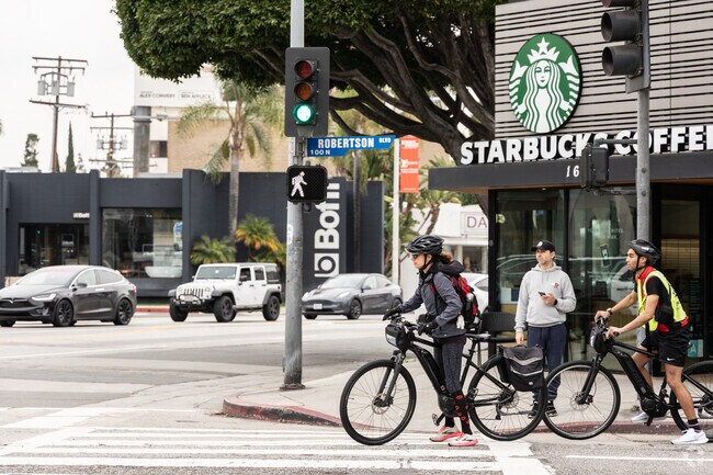 Biking is a convenient mode of transportation in the commercial area of Beverly Grove.
