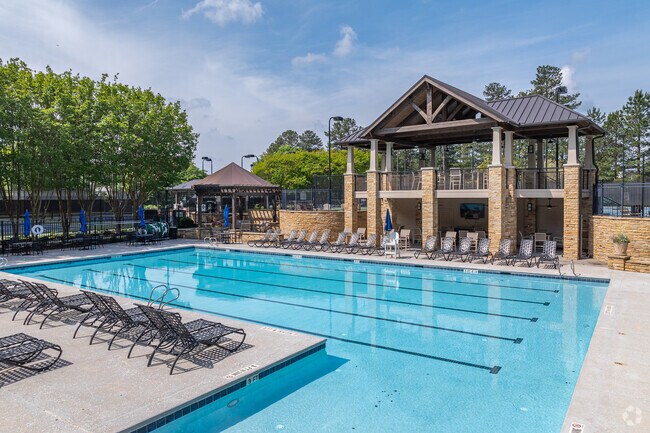 Residents of Nesbit Lakes enjoy a resort-style pool area perfect for relaxation and recreation.