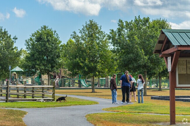 People love to bring their dogs out to walk the trails in Browns Branch Park.