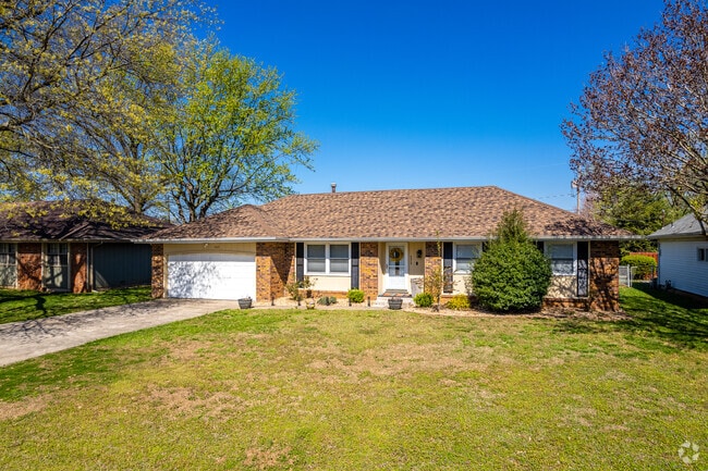 Homes in the Kickapoo neighborhood occupy larger lots often shaded with large mature trees
