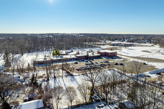 Linden Elementary School's main pickup drive runs through the lot and past the front entrance.