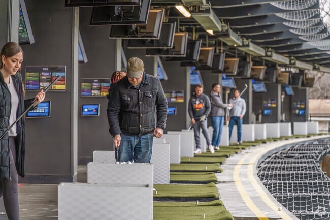 T-Shotz Golf & Entertainment Venue offers residents of New Mark a chance to golf all year long.