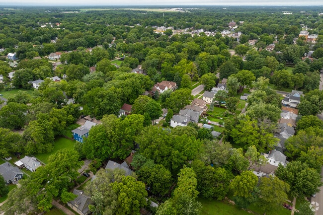 Mature trees surround most properties in Enos Park.