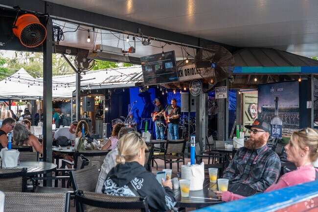 Residents of Deep Forest Village enjoy daily live music at First Turn Port Orange.