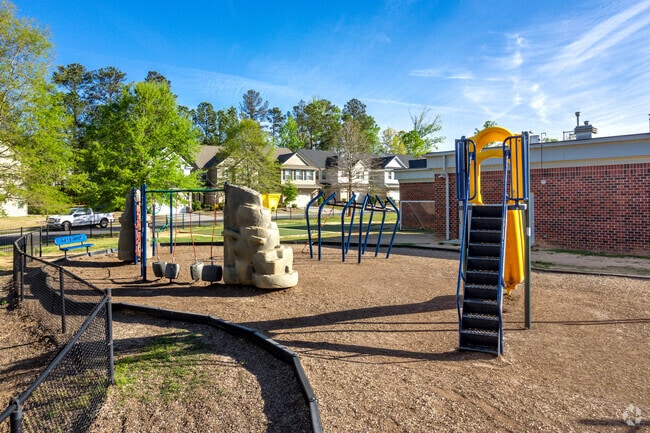 The playground at Ballantyne Elementary is bordered by homes in the Ballantyne community.