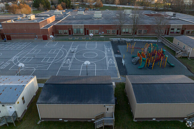 Ther portables surround the blacktop at Hollifield Station Elementary.