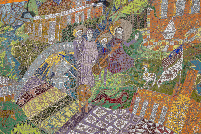 A mosaic on the side of the City Hall artfully retells San Pablo's history.