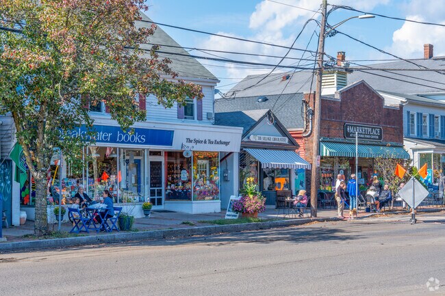 Residents of Guilford enjoy strolling on vibrant streets featuring quaint local businesses.