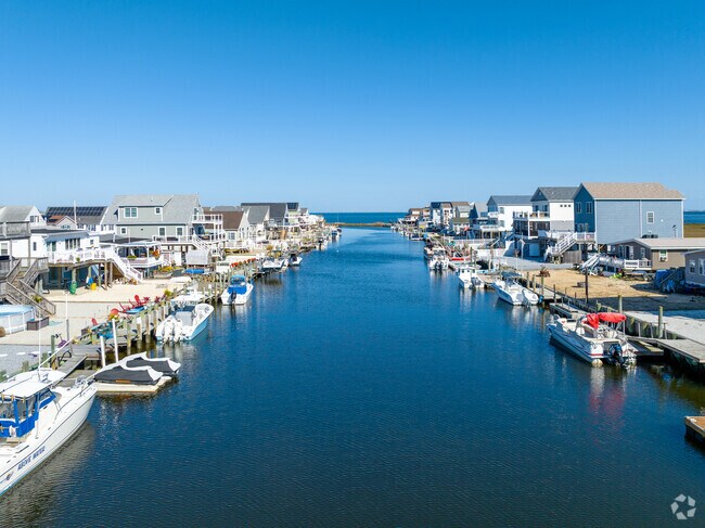 Water replaces grass for a backyard in Tuckerton Beach.