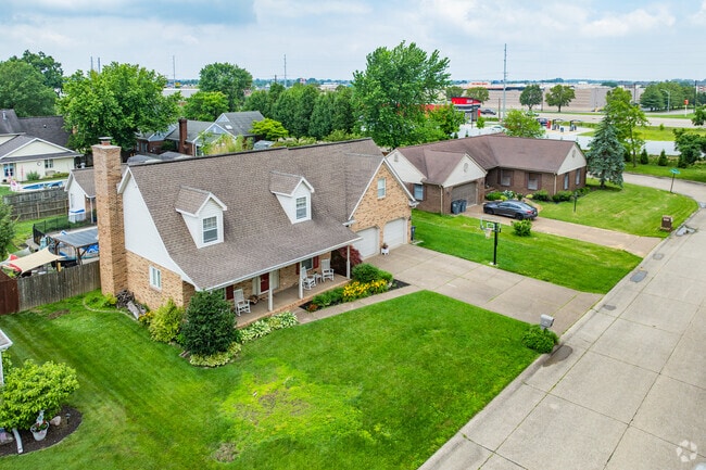 Homes in Plaza Park are often decorated with neat rows of shrubbery and floral bushes.