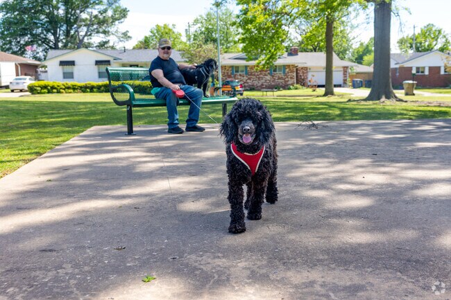 Darlington Park welcomes dogs and offers basketball and tennis.