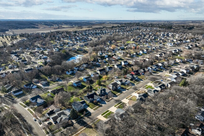 The Manor neighborhood consists of tree-lined streets and rolling hills.