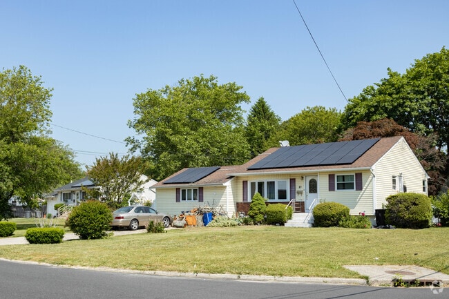 Solar panels on ranch style homes roofs are a common sight in Brentwood, NY.
