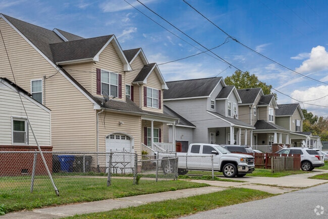 Remodeled and newly-built traditional homes line the streets of Ballentine Place.