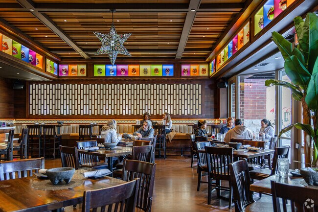 Near Fairview is Mago Grill and Cantina, a colorful space decorated with Luchador masks.