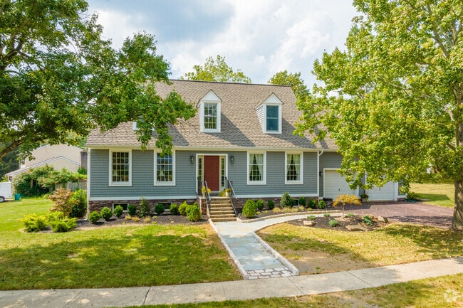 Dormer windows give this Cape Cod some lovely character in Lower Frederick Township.
