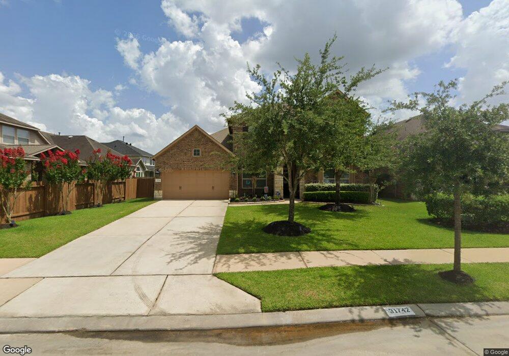 31742 Serrano Bluff Ln, Spring, TX 77386 - photo 1