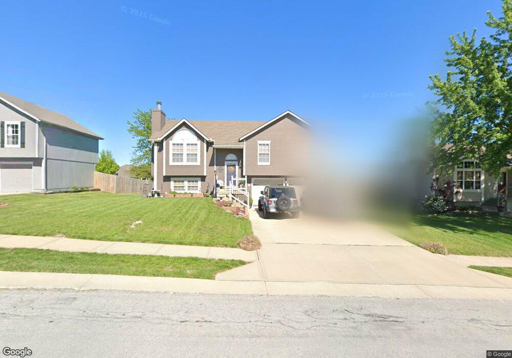 313 S Pelham Path, Raymore, MO 64083 - photo 1