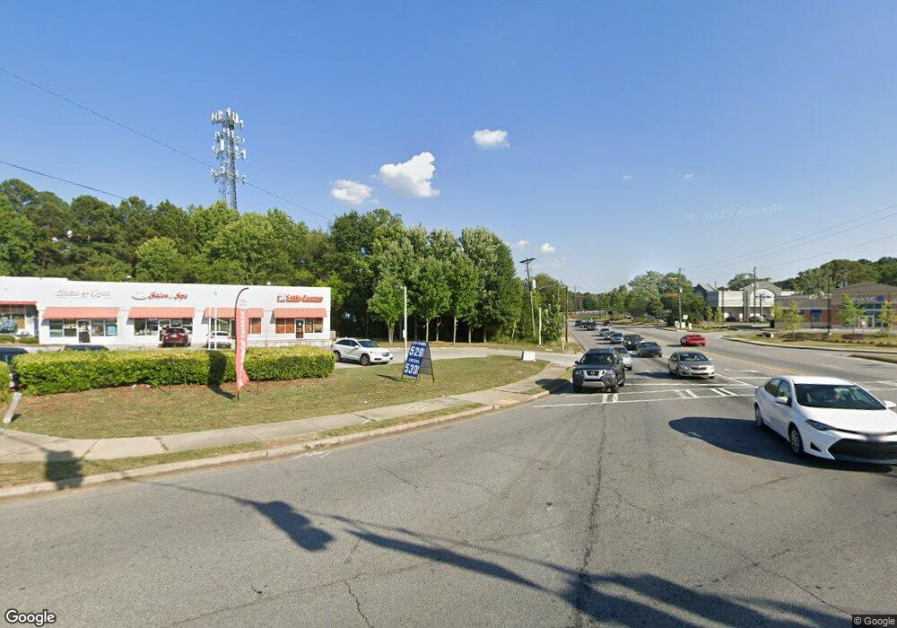 5498 Five Forks Trickum Rd SW, Lilburn, GA 30047 - photo 1