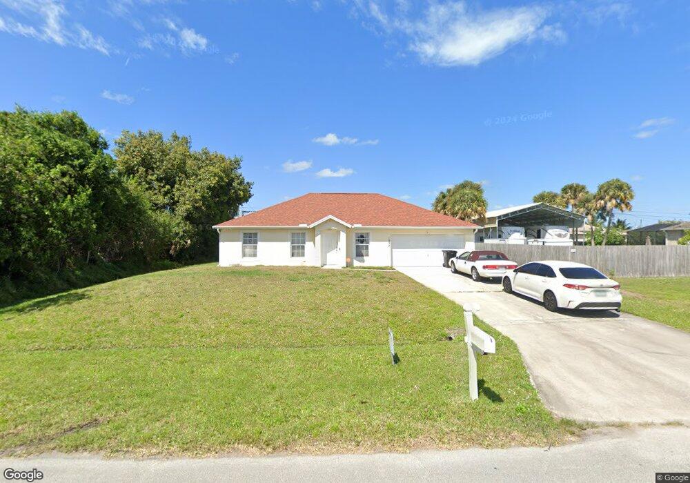 1057 SW Calmar Ave, Port Saint Lucie, FL 34953 - photo 1