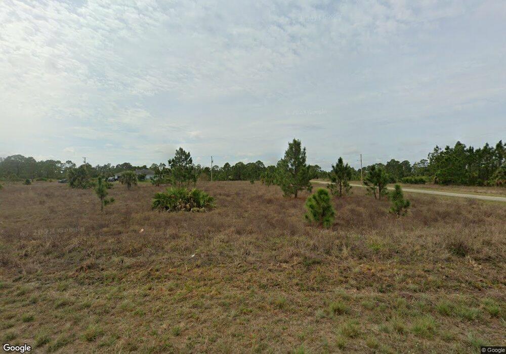 1106 Eaves St, Lehigh Acres, FL 33974 - photo 1