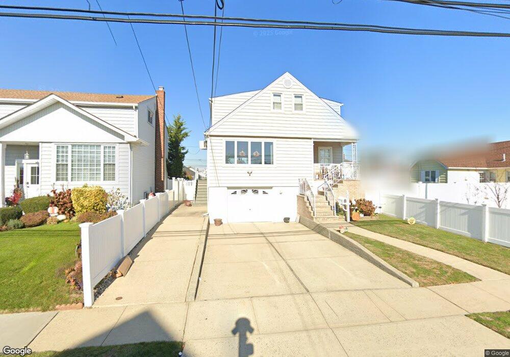 40 Sagamore Rd, Island Park, NY 11558 - photo 1