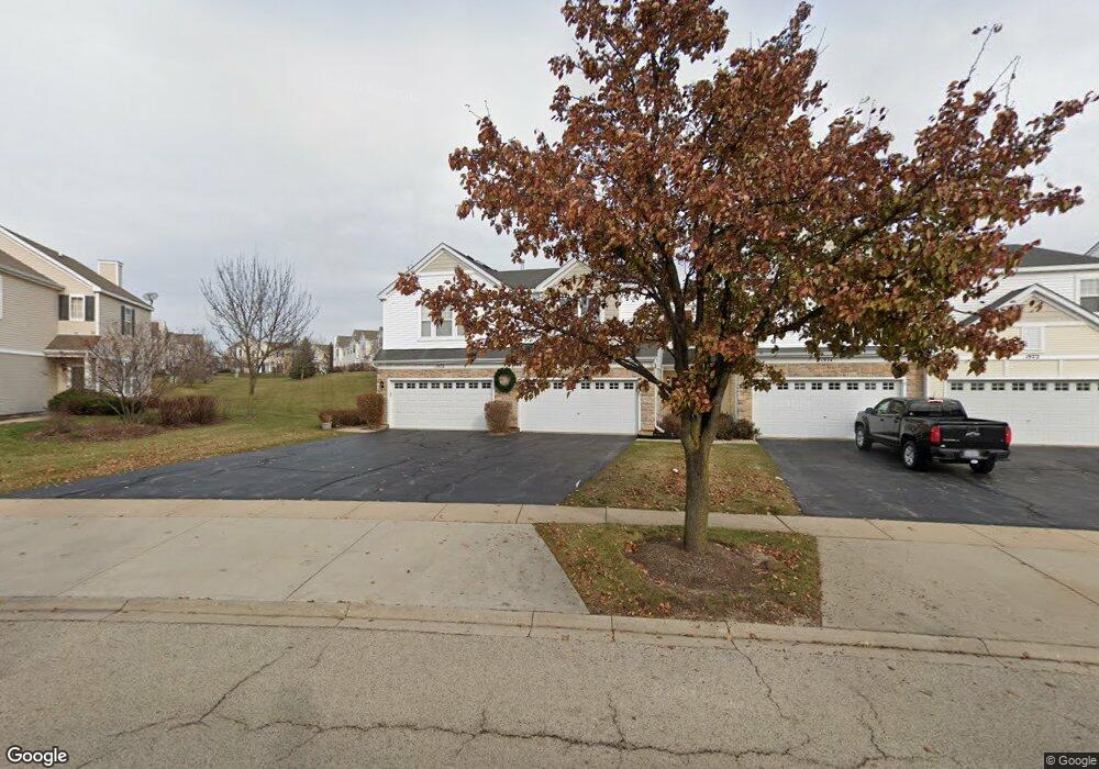 1976 Cobblestone Dr unit 822, Carpentersville, IL 60110 - photo 1