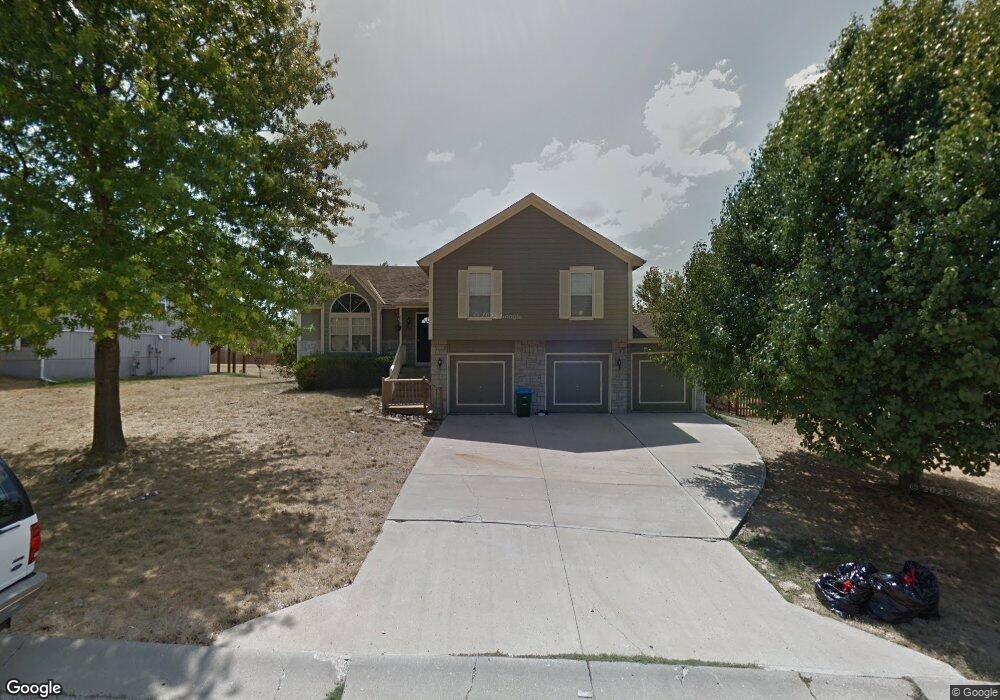 1515 Colt Cir, Raymore, MO 64083 - photo 1