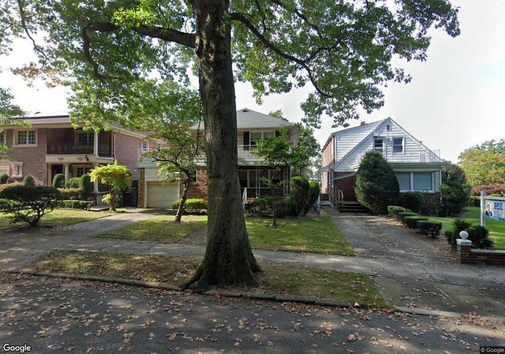 18891 Avon Rd, Hollis, NY 11423 - photo 1