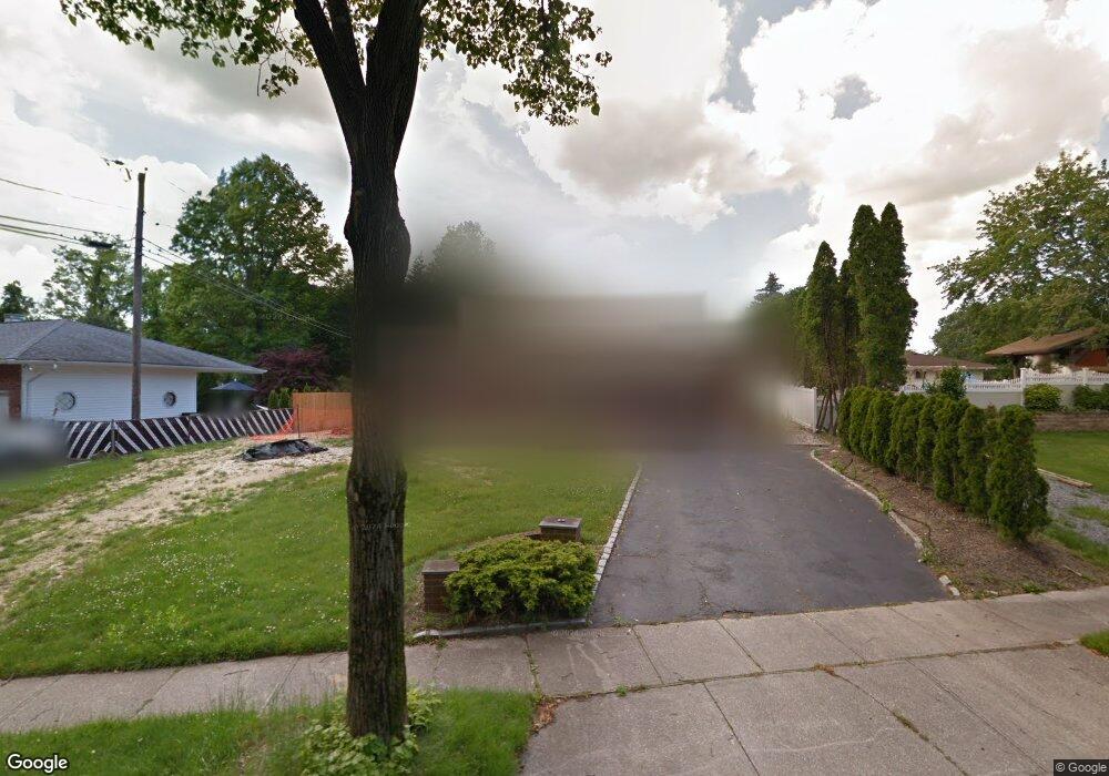 66 Fisher Rd, ComMacK, NY 11725 - photo 1