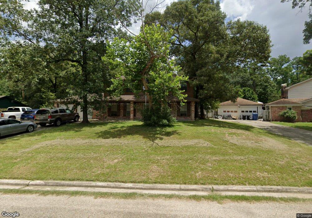 10243 Woodhollow Dr, Conroe, TX 77385 - photo 1