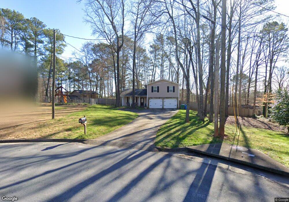 1054 Camp Creek Dr SW, Lilburn, GA 30047 - photo 1